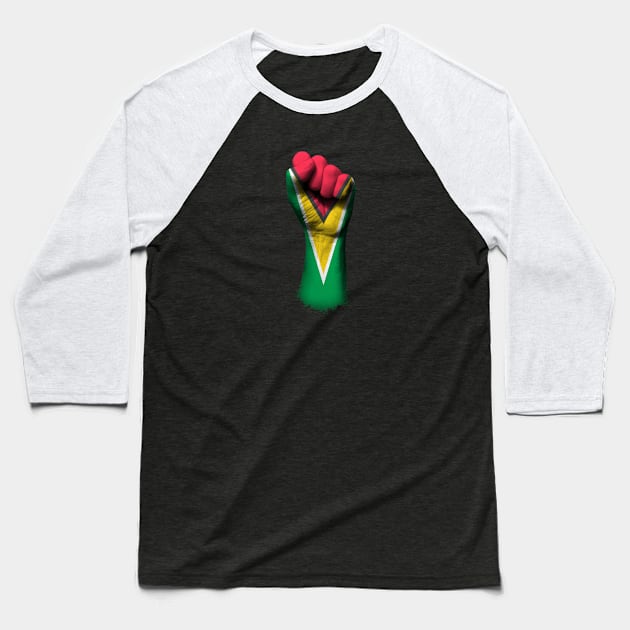 Flag of Guyana on a Raised Clenched Fist Baseball T-Shirt by jeffbartels
